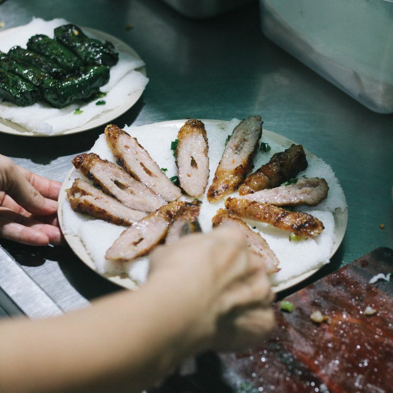 Displaying Nem Nuong on the plate