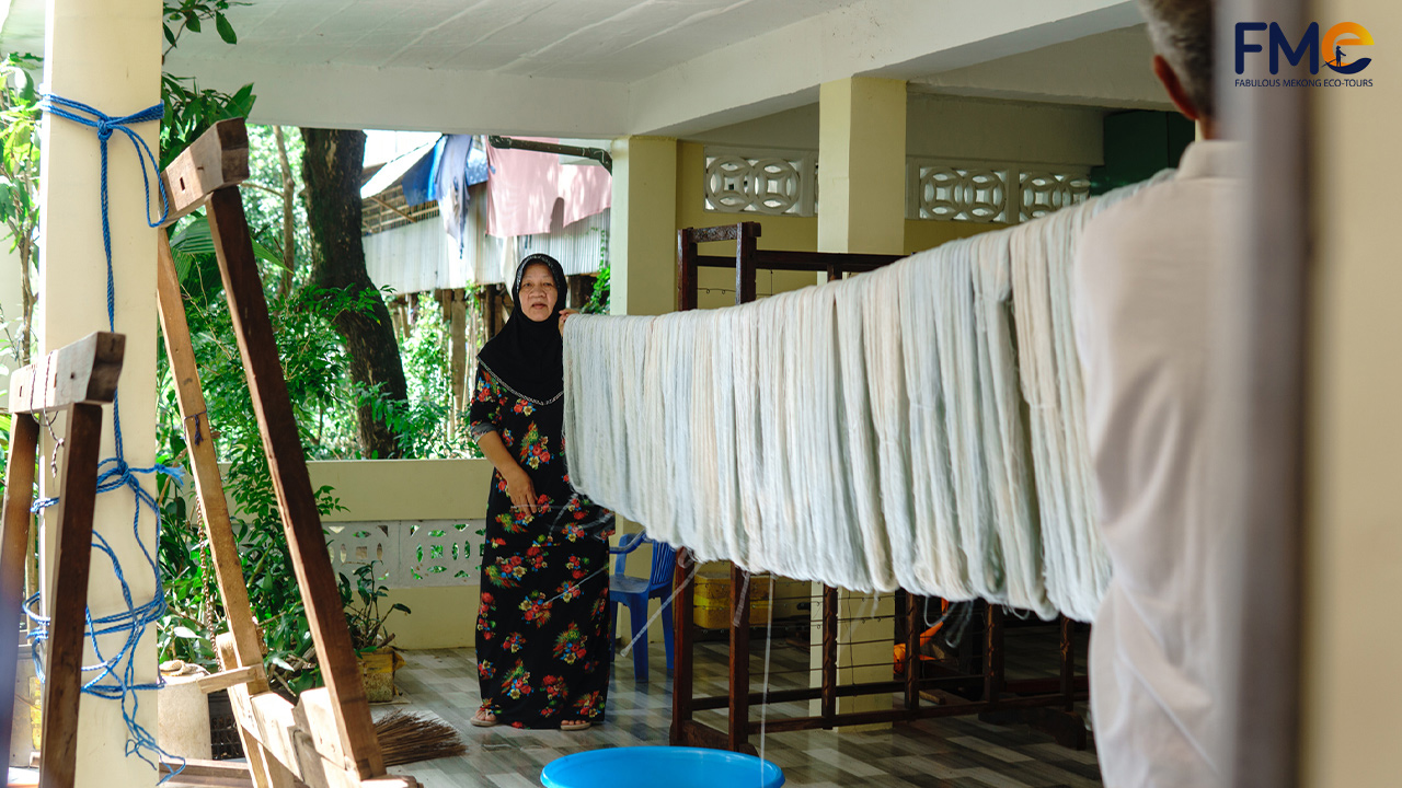 Locals dry bandanna in Islamic village in An Giang