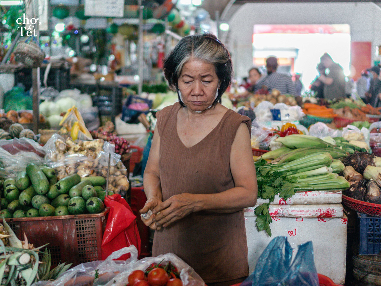 Vegetable seller at Vietnamese market