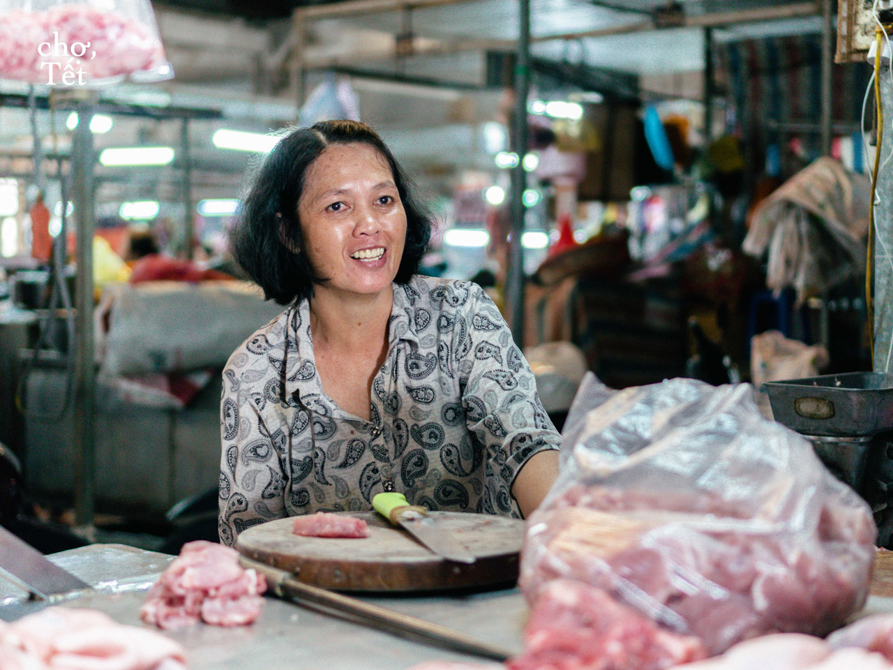 Vietnamese woman selling meat