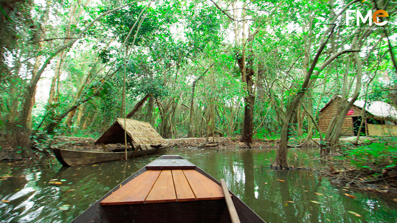 Boat paddling in Xeo Quyt historical site in Dong Thap full day tou