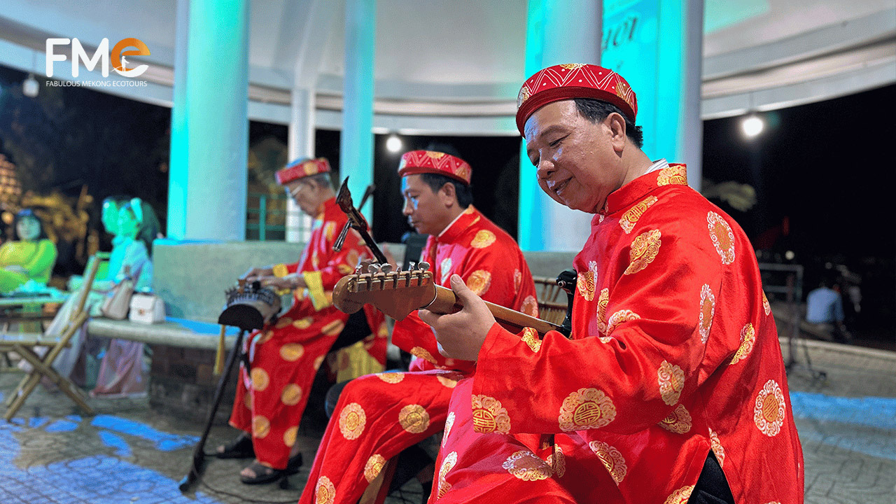 Men playing traditional instruments at the "Don Ca Tai Tu" concert