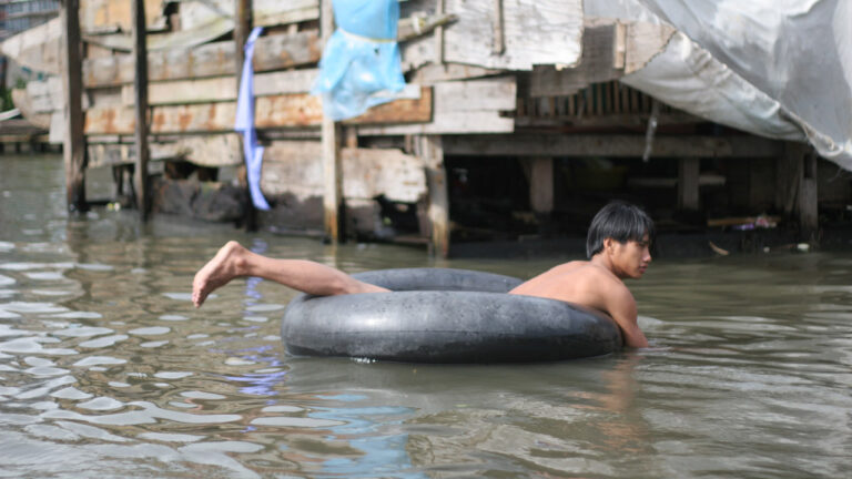 People swim in Ca Mau