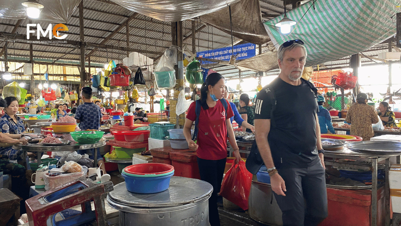 Visit local market in cooking class in Mekong Delta