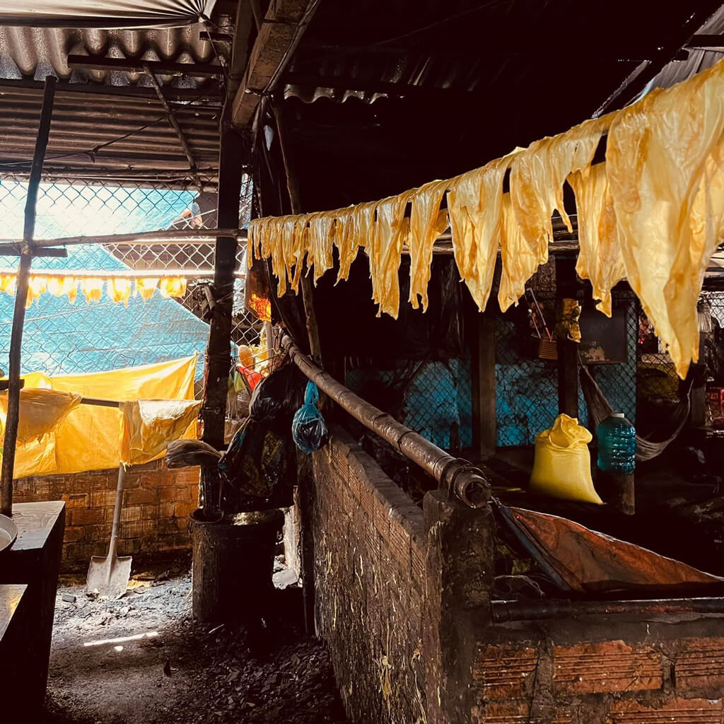 Making traditional Tofu skin in Vinh Long - Photo by Huang Long