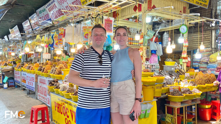 Travellers visit Chau Doc market