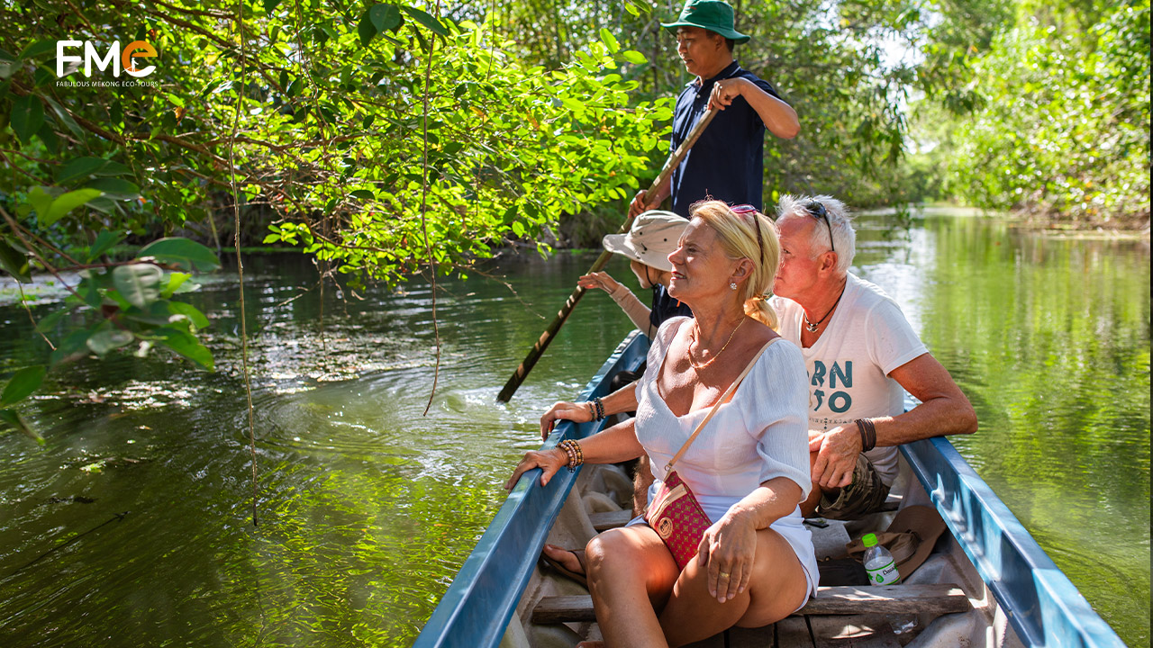 Tourists learning about mangrove species at Lung Ngoc Hoang