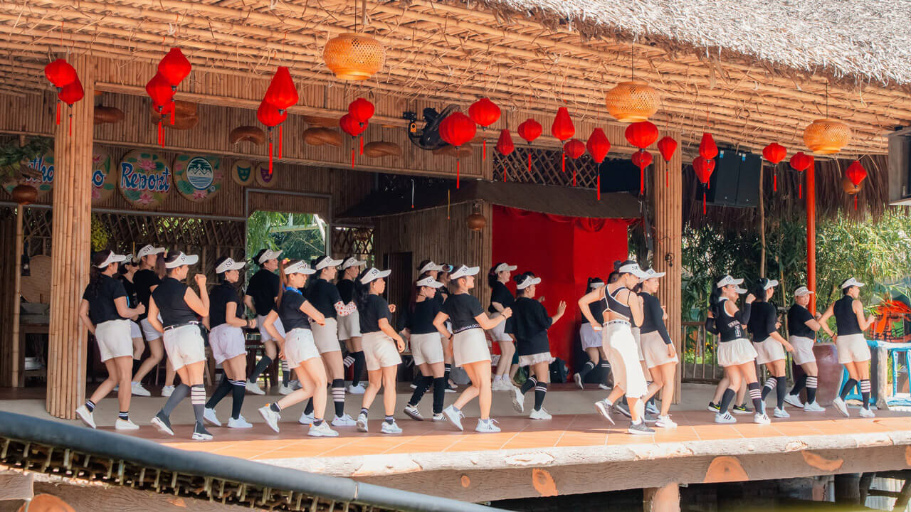 Tourists practice morning dance at Can Tho Eco Resort
