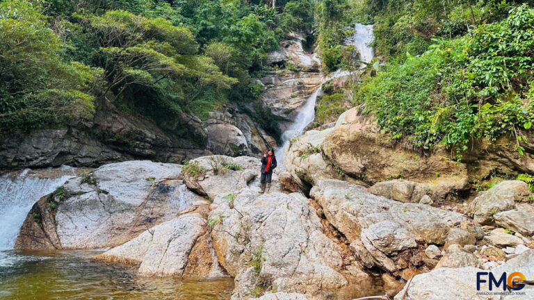 Discovering a pristine waterfall amidst nature in Tây Côn Lĩnh, a highlight of the Hà Giang trekking adventure