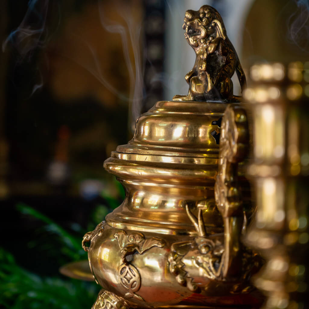 Ornate altar decor at Le Cong Ancestral House, preserving traditional Vietnamese worship practices