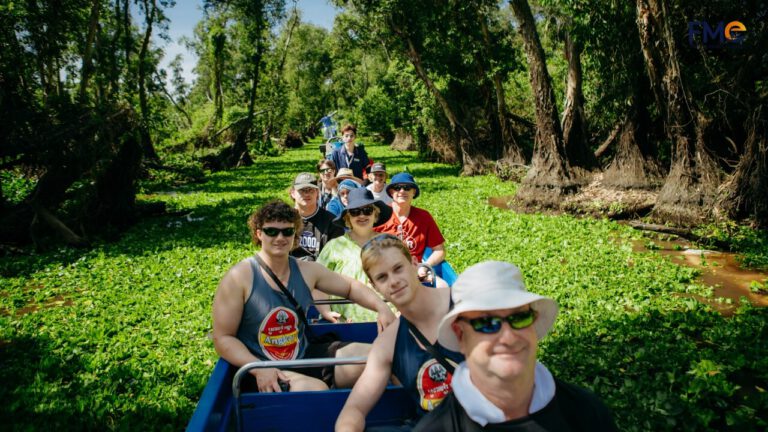 Visitors take photo and check in at Tra Su forest