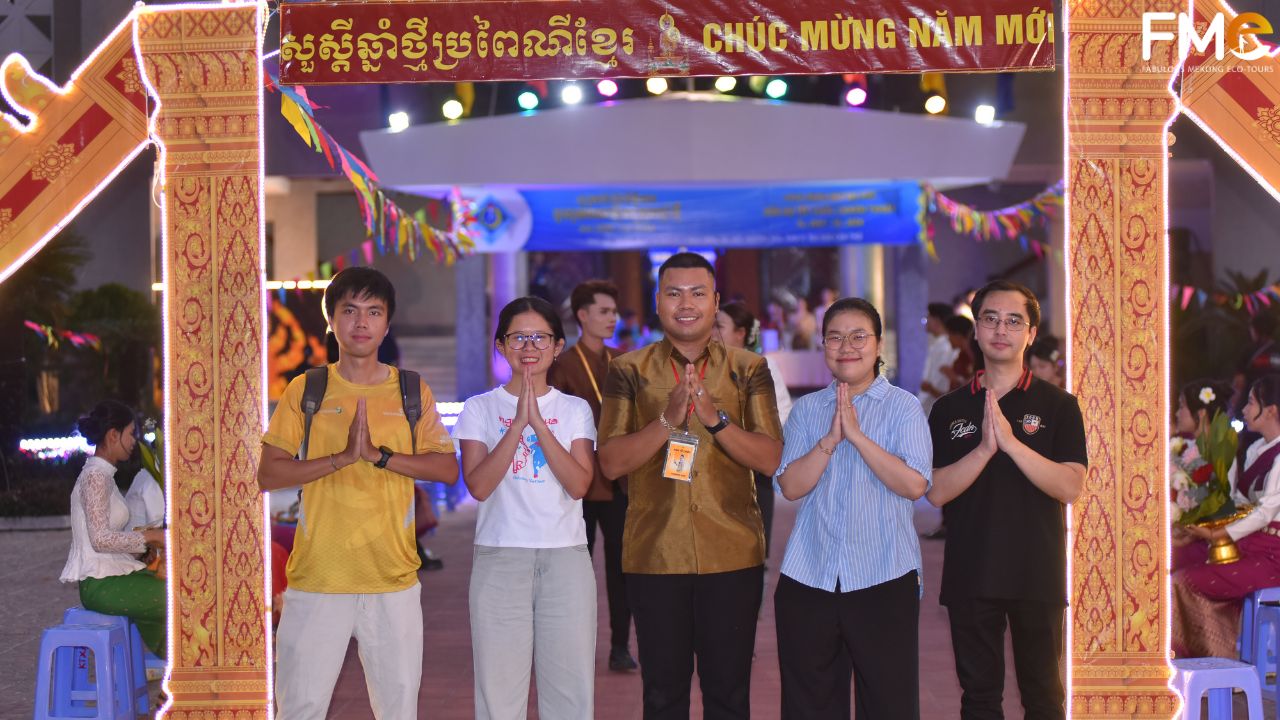 FME Travel representative joining the vibrant atmosphere of the Khmer New Year 2026 at Can Tho University.